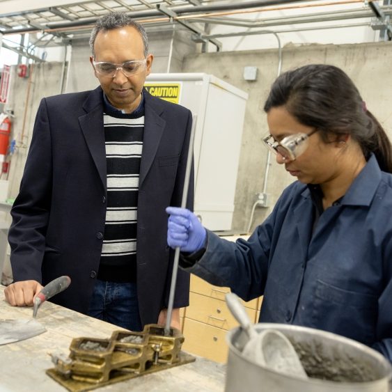 Two researchers work in the Civil Engineering lab.