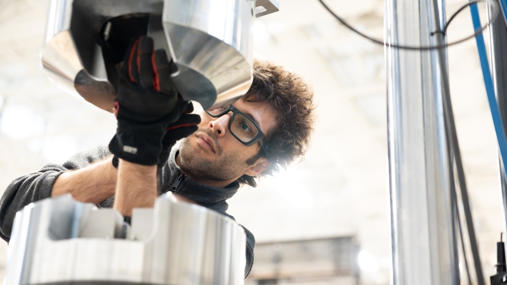 A student works with equipment in the Civil Engineering lab.