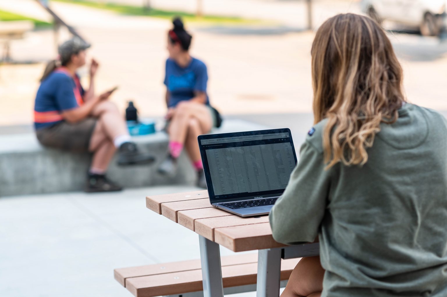 Student working on a laptop at UBCO campus