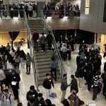 People in the EME atrium at Industry Night