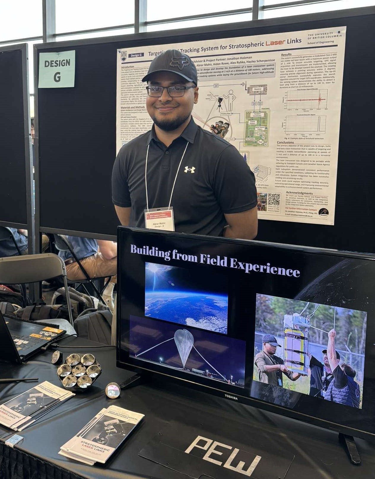 Man in front of project board
