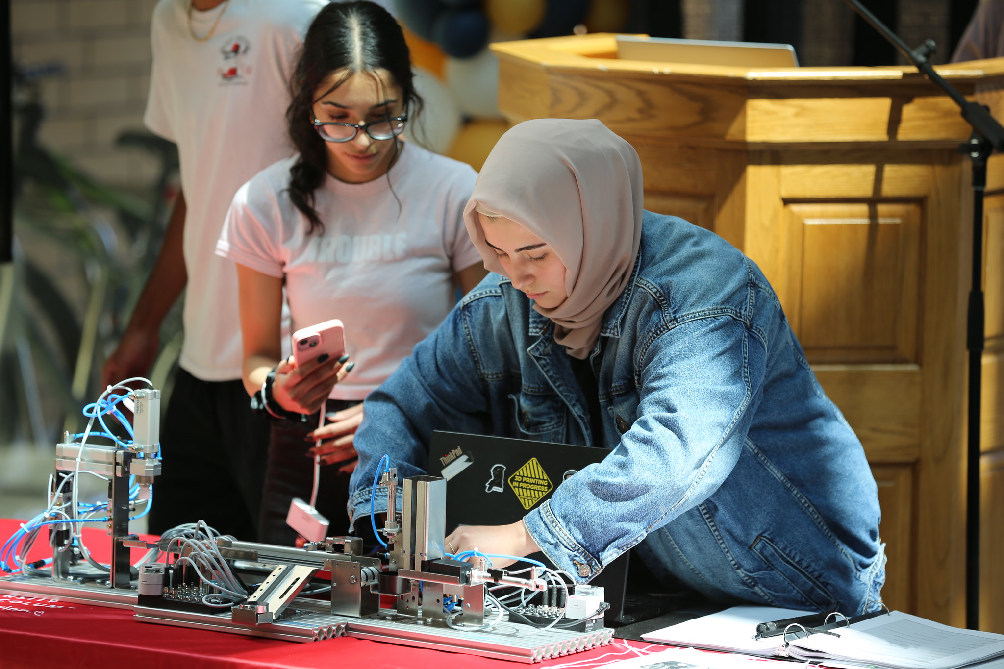 students working on an apparatus